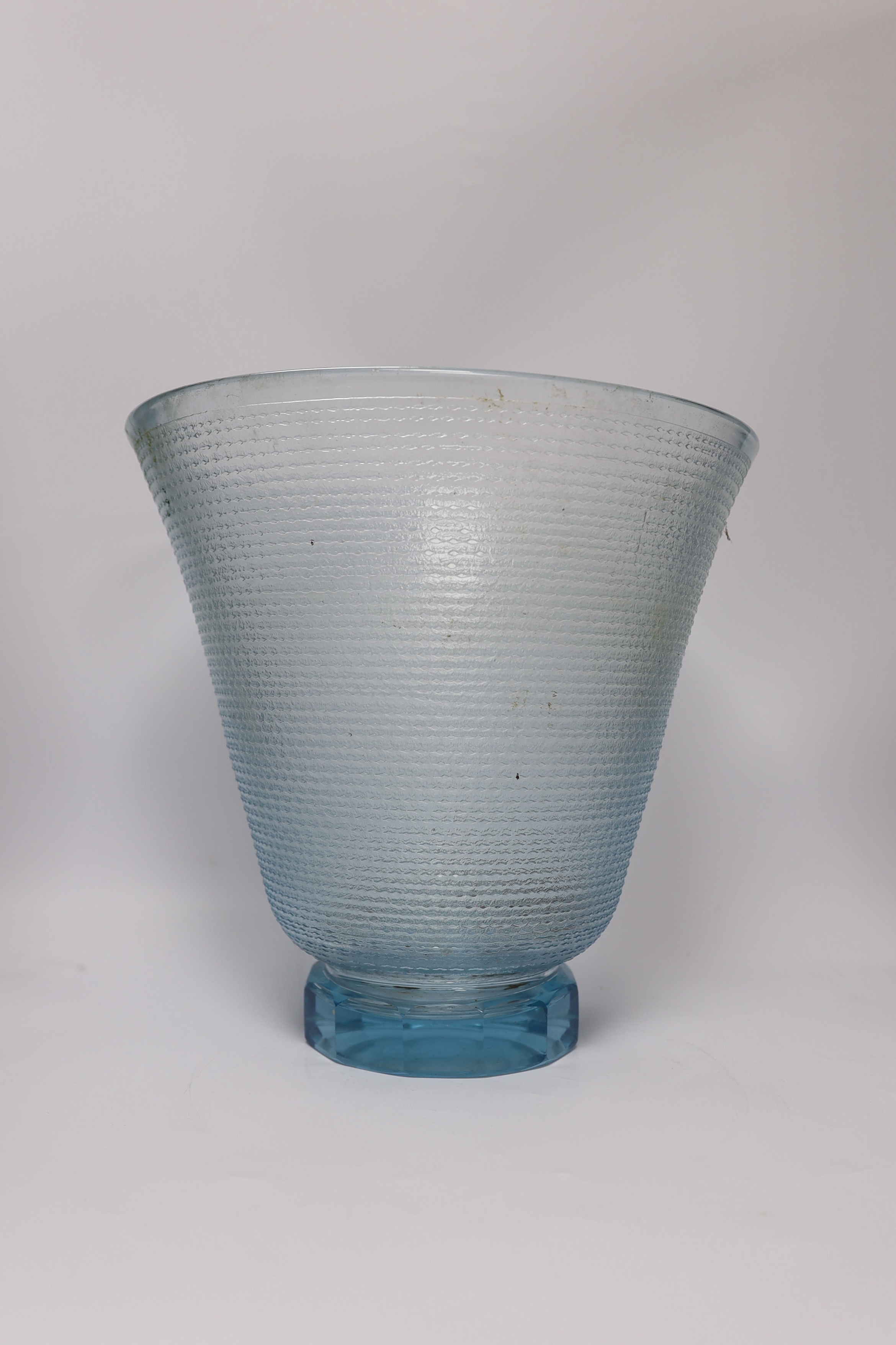 A large heavy cut glass tazza with shaped rim, a tall blue tinted textured vase, height 31.5cm and a crackle finish water jug (3)